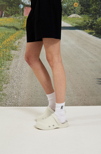 Load image into Gallery viewer, 23.65 Bisbee Rubber Mules Ecru